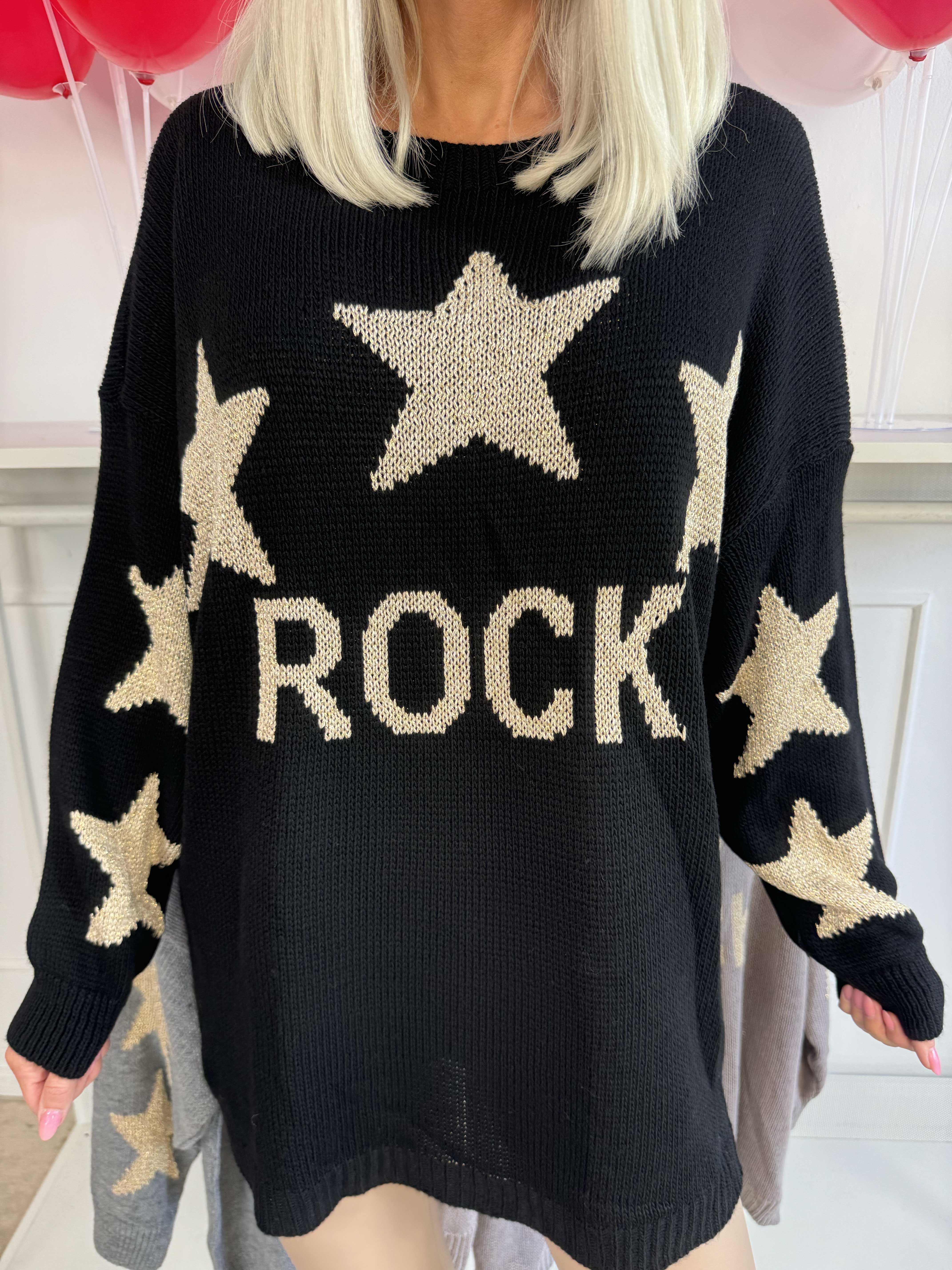 Rock - Strikbluse med stjerner i guldtråde